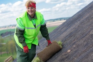Woman with erosion control mats