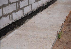 Waterproofing and vapor barrier on concrete foundation